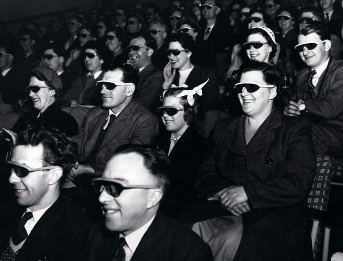 Audience wearing special glasses watch a 3D "stereoscopic film" at the Telekinema on the South Bank in London during the Festival of Britain